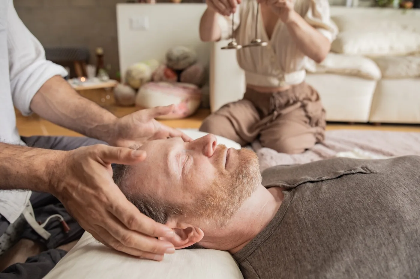A practitioner grounding before a session at the Word of Mouth healing room in Los Angeles